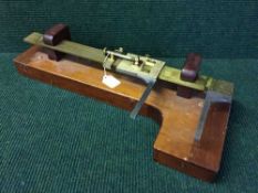 An early twentieth century precision measure by Troughton and Simms of London in fitted mahogany