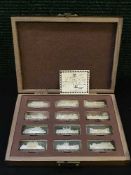 The Birmingham Mint, Royal Palaces, A collection of 12 sterling silver ingots,