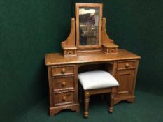 A contemporary dressing table with stool