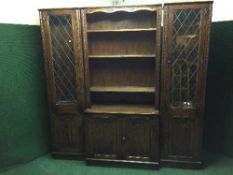 An Old Charm three piece break-front bookcase