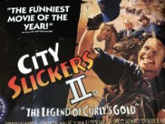 A box of assorted film posters, mainly from the 1980's including Twins, City Slickers 2,