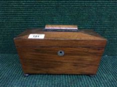 A Victorian mahogany tea caddy