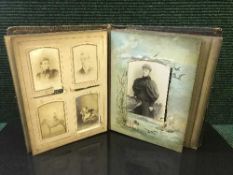 A Victorian embossed leather photograph album,