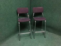 A pair of late twentieth century tubular metal bar chairs