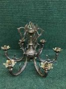 A Rococco style bronze light with chain and ceiling boss.