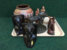 A tray of wooden bookends, figures, carved hardwood dragon on stand,