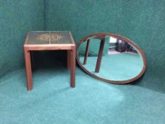 A mid twentieth century tiled teak lamp table together with an Edwardian oak mirror