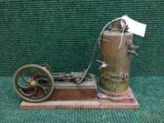 A scratch built piston engine and boiler on plinth