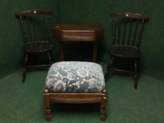 An oak upholstered foot stool,
