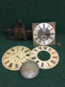 A tray of two Grandfather clock faces with movements