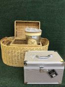 A set of three graduated wicker baskets, picnic basket, vases, storage boxes, repro.