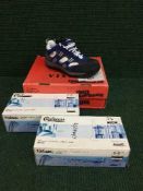 Eight pairs of lady's industrial safety shoes and a box of latex gloves