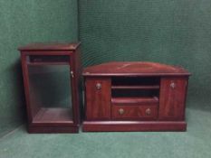 A mahogany stag entertainment unit together with an audio cabinet