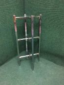 A contemporary glass three tier stand