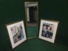 A gilt framed hall mirror and a pair of gilt framed Michael MacDonagh Wood prints - Venice canal