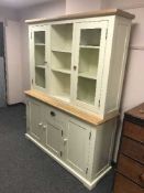 A contemporary painted kitchen dresser with glazed top