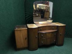 A three piece early 20th century walnut bedroom suite