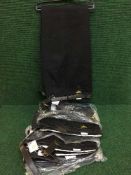 A box of Port West work trousers and belts