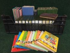 Two boxes containing Reader's Digest books, Noddy books,