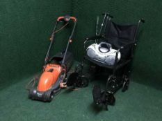 A folding wheel chair, Flymo electric mower,