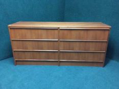 A teak six drawer chest