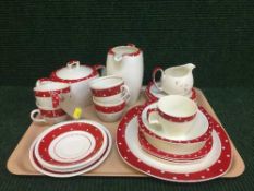 A tray of English Mid Winter Style Craft red and white spotted tea service