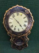 A 19th century papier mache wall clock with mother of pearl inlay