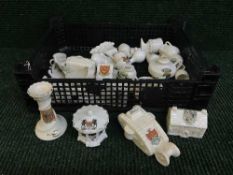 A basket of crested china