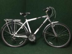 A lady's Giant Expression DX hybrid cycle