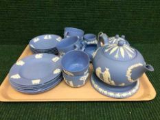A tray of twenty three pieces of Wedgwood Jasper ware tea service