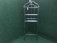 A contemporary metal hat and coat stand