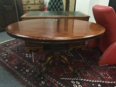 A Victorian mahogany pedestal breakfast table