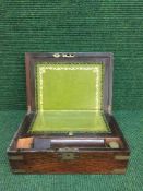 A Victorian rosewood brass bound writing box