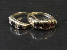 A 9ct gold and garnet set ring,