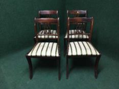 A set of four mahogany Regency style chairs