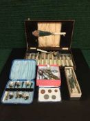 A tray of cased fish plated cutlery, teaspoons, butter knives,