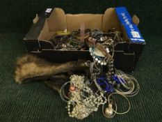 A box of costume jewellery - watches,