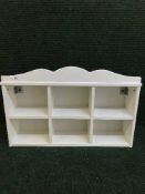 A white Ikea wall shelf