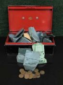 A vintage tin containing a collection of English copper coinage,