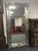 A Victorian style silvered mirror