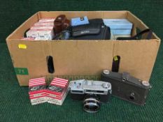 A box of cameras by Konica, Agfa, camera accessories,