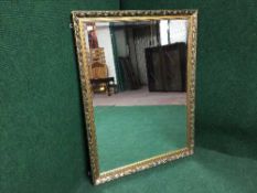 A gilt framed bevelled mirror