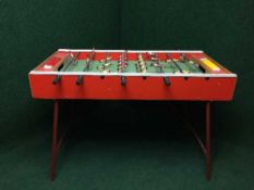 A mid 20th century folding table football game