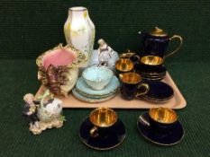 A tray of Jersey pottery tea china, Evesham oven dish, Wedgwood vase,