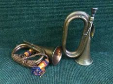 Two copper and brass bugles