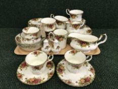 A tray of Royal Albert Old Country Roses tea set