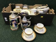 Two boxes of collector's dolls, cased cutlery, beer steins, china,