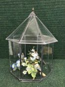 A leaded glass vivarium and four china bird ornaments