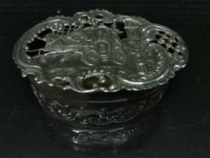 A silver box depicting a coaching scene London 1903