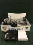 A box of Wii controls, Wii fit board, mega drive, leads, computer games etc.